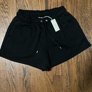 NWT Cozi black fleece shorts. Size medium.